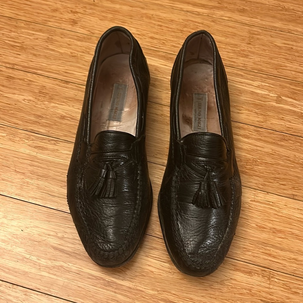 Vintage Bruno Magli black leather tasseled loafers.